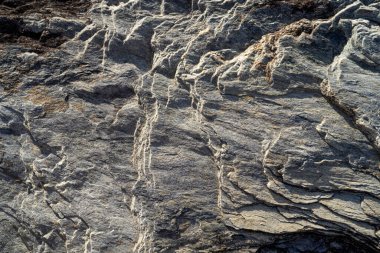 Kırsal taşlar, paslanmış dokular, renkli ve ilginç arka planlar ve büyüleyici dokular, web tasarımı ve soyut arka plan için kullanılır.