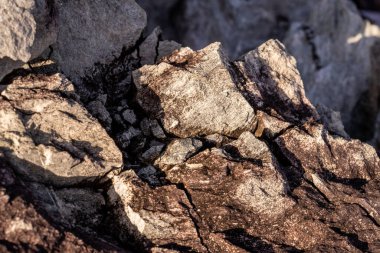 Kırsal taşlar, paslanmış dokular, renkli ve ilginç arka planlar ve büyüleyici dokular, web tasarımı ve soyut arka plan için kullanılır.