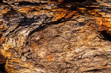 Kırsal taşlar, paslanmış dokular, renkli ve ilginç arka planlar ve büyüleyici dokular, web tasarımı ve soyut arka plan için kullanılır.