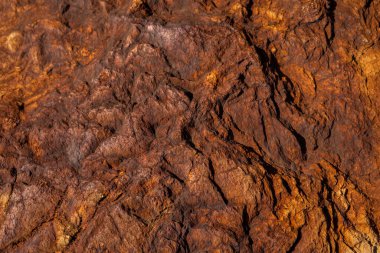 Kırsal taşlar, paslanmış dokular, renkli ve ilginç arka planlar ve büyüleyici dokular, web tasarımı ve soyut arka plan için kullanılır.