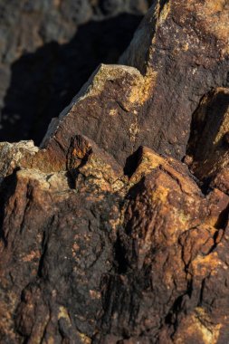 Kırsal taşlar, paslanmış dokular, renkli ve ilginç arka planlar ve büyüleyici dokular, web tasarımı ve soyut arka plan için kullanılır.