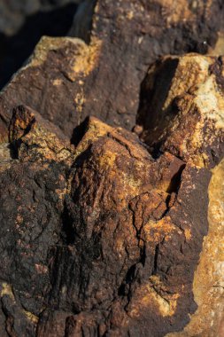 Kırsal taşlar, paslanmış dokular, renkli ve ilginç arka planlar ve büyüleyici dokular, web tasarımı ve soyut arka plan için kullanılır.