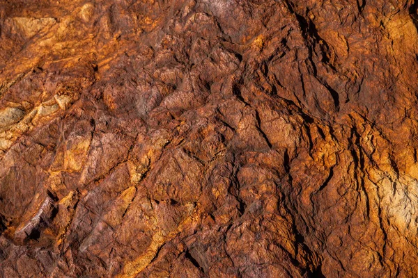 Kırsal taşlar, paslanmış dokular, renkli ve ilginç arka planlar ve büyüleyici dokular, web tasarımı ve soyut arka plan için kullanılır.