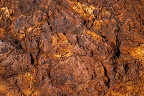 Kırsal taşlar, paslanmış dokular, renkli ve ilginç arka planlar ve büyüleyici dokular, web tasarımı ve soyut arka plan için kullanılır.