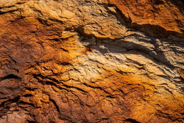 Kırsal taşlar, paslanmış dokular, renkli ve ilginç arka planlar ve büyüleyici dokular, web tasarımı ve soyut arka plan için kullanılır.