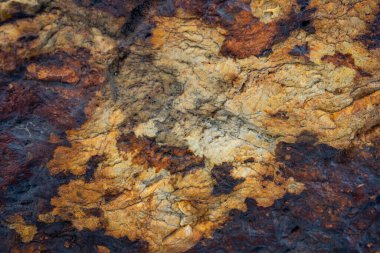 Kırsal taşlar, paslanmış dokular, renkli ve ilginç arka planlar ve büyüleyici dokular, web tasarımı ve soyut arka plan için kullanılır.