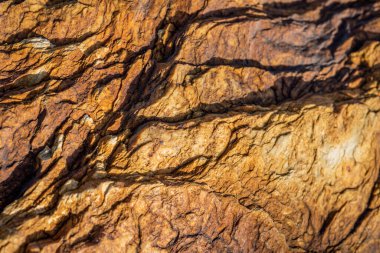 Kırsal taşlar, paslanmış dokular, renkli ve ilginç arka planlar ve büyüleyici dokular, web tasarımı ve soyut arka plan için kullanılır.