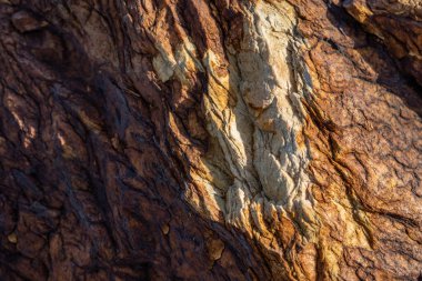 Kırsal taşlar, paslanmış dokular, renkli ve ilginç arka planlar ve büyüleyici dokular, web tasarımı ve soyut arka plan için kullanılır.