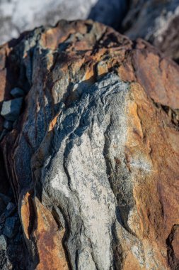 Kırsal taşlar, paslanmış dokular, renkli ve ilginç arka planlar ve büyüleyici dokular, web tasarımı ve soyut arka plan için kullanılır.