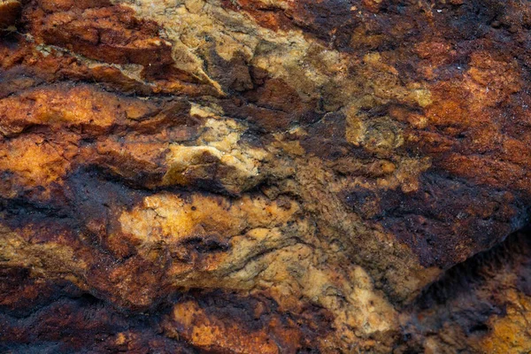 Kırsal taşlar, paslanmış dokular, renkli ve ilginç arka planlar ve büyüleyici dokular, web tasarımı ve soyut arka plan için kullanılır.