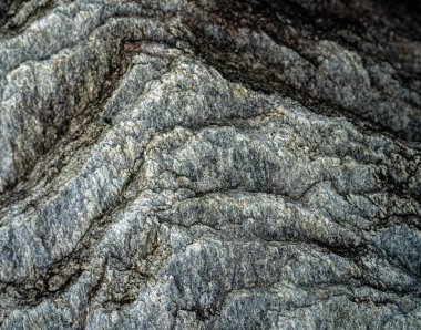 Kırsal taşlar, paslanmış dokular, renkli ve ilginç arka planlar ve büyüleyici dokular, web tasarımı ve soyut arkaplanlar için kullanılır.