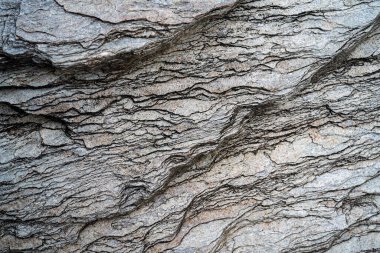 Kırsal taşlar, paslanmış dokular, renkli ve ilginç arka planlar ve büyüleyici dokular, web tasarımı ve soyut arkaplanlar için kullanılır.