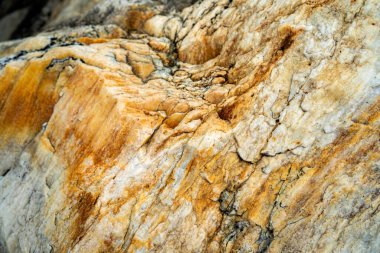 Kırsal taşlar, paslanmış dokular, renkli ve ilginç arka planlar ve büyüleyici dokular, web tasarımı ve soyut arkaplanlar için kullanılır.