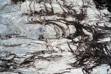 Kırsal taşlar, paslanmış dokular, renkli ve ilginç arka planlar ve büyüleyici dokular, web tasarımı ve soyut arkaplanlar için kullanılır.