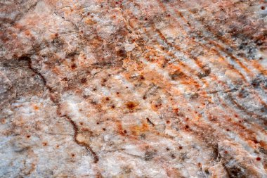 Kırsal taşlar, paslanmış dokular, renkli ve ilginç arka planlar ve büyüleyici dokular, web tasarımı ve soyut arkaplanlar için kullanılır.