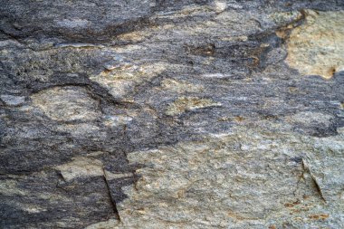 Kırsal taşlar, paslanmış dokular, renkli ve ilginç arka planlar ve büyüleyici dokular, web tasarımı ve soyut arkaplanlar için kullanılır.