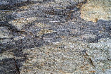 Kırsal taşlar, paslanmış dokular, renkli ve ilginç arka planlar ve büyüleyici dokular, web tasarımı ve soyut arkaplanlar için kullanılır.