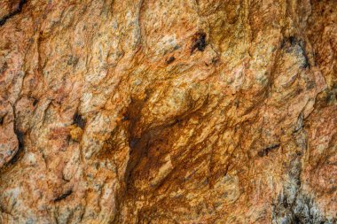 Kırsal taşlar, paslanmış dokular, renkli ve ilginç arka planlar ve büyüleyici dokular, web tasarımı ve soyut arkaplanlar için kullanılır.