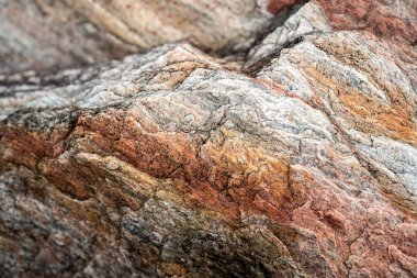 Kırsal taşlar, paslanmış dokular, renkli ve ilginç arka planlar ve büyüleyici dokular, web tasarımı ve soyut arkaplanlar için kullanılır.