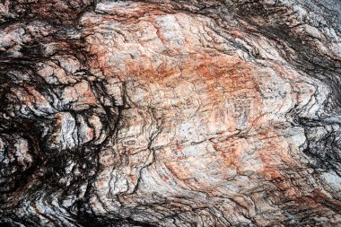 Kırsal taşlar, paslanmış dokular, renkli ve ilginç arka planlar ve büyüleyici dokular, web tasarımı ve soyut arkaplanlar için kullanılır.