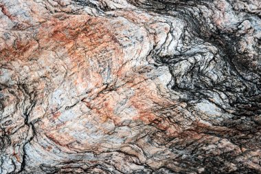 Kırsal taşlar, paslanmış dokular, renkli ve ilginç arka planlar ve büyüleyici dokular, web tasarımı ve soyut arkaplanlar için kullanılır.