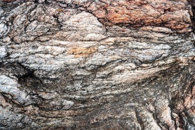 Kırsal taşlar, paslanmış dokular, renkli ve ilginç arka planlar ve büyüleyici dokular, web tasarımı ve soyut arkaplanlar için kullanılır.