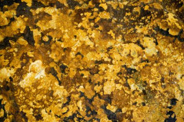 Kırsal taşlar, paslanmış dokular, renkli ve ilginç arka planlar ve büyüleyici dokular, web tasarımı ve soyut arkaplanlar için kullanılır.