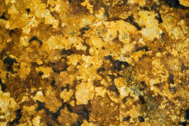 Kırsal taşlar, paslanmış dokular, renkli ve ilginç arka planlar ve büyüleyici dokular, web tasarımı ve soyut arkaplanlar için kullanılır.