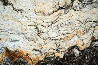 Kırsal taşlar, paslanmış dokular, renkli ve ilginç arka planlar ve büyüleyici dokular, web tasarımı ve soyut arkaplanlar için kullanılır.