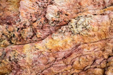 Kırsal taşlar, paslanmış dokular, renkli ve ilginç arka planlar ve büyüleyici dokular, web tasarımı ve soyut arkaplanlar için kullanılır.