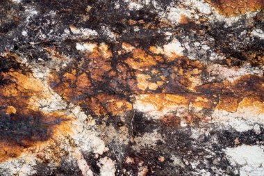 Kırsal taşlar, paslanmış dokular, renkli ve ilginç arka planlar ve büyüleyici dokular, web tasarımı ve soyut arkaplanlar için kullanılır.