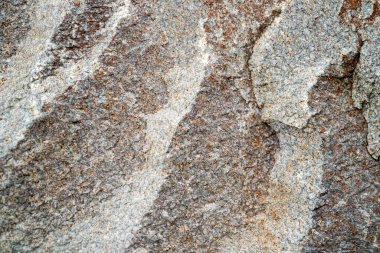 Kırsal taşlar, paslanmış dokular, renkli ve ilginç arka planlar ve büyüleyici dokular, web tasarımı ve soyut arkaplanlar için kullanılır.