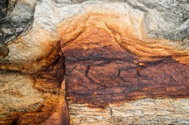 Kırsal taşlar, paslanmış dokular, renkli ve ilginç arka planlar ve büyüleyici dokular, web tasarımı ve soyut arkaplanlar için kullanılır.