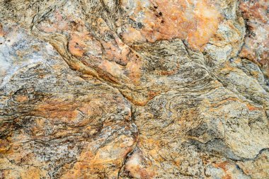 Kırsal taşlar, paslanmış dokular, renkli ve ilginç arka planlar ve büyüleyici dokular, web tasarımı ve soyut arkaplanlar için kullanılır.