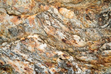 Kırsal taşlar, paslanmış dokular, renkli ve ilginç arka planlar ve büyüleyici dokular, web tasarımı ve soyut arkaplanlar için kullanılır.