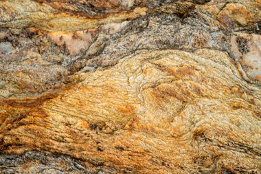 Kırsal taşlar, paslanmış dokular, renkli ve ilginç arka planlar ve büyüleyici dokular, web tasarımı ve soyut arkaplanlar için kullanılır.