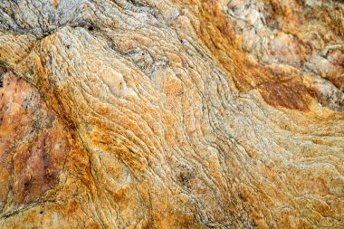 Kırsal taşlar, paslanmış dokular, renkli ve ilginç arka planlar ve büyüleyici dokular, web tasarımı ve soyut arkaplanlar için kullanılır.