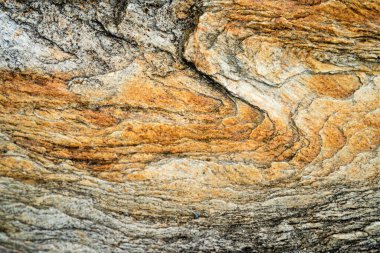 Kırsal taşlar, paslanmış dokular, renkli ve ilginç arka planlar ve büyüleyici dokular, web tasarımı ve soyut arkaplanlar için kullanılır.