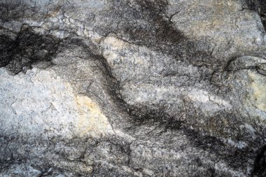 Kırsal taşlar, paslanmış dokular, renkli ve ilginç arka planlar ve büyüleyici dokular, web tasarımı ve soyut arkaplanlar için kullanılır.