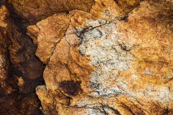 Kırsal taşlar, paslanmış dokular, renkli ve ilginç arka planlar ve büyüleyici dokular, web tasarımı ve soyut arkaplanlar için kullanılır.