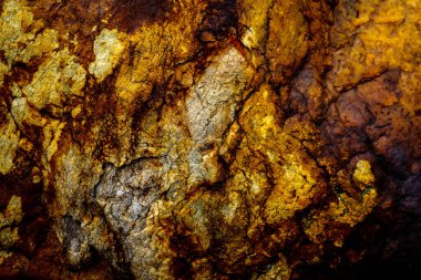 Kırsal taşlar, paslanmış dokular, renkli ve ilginç arka planlar ve büyüleyici dokular, web tasarımı ve soyut arkaplanlar için kullanılır.