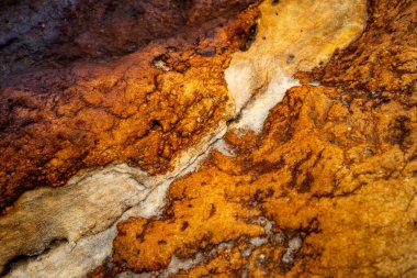 Kırsal taşlar, paslanmış dokular, renkli ve ilginç arka planlar ve büyüleyici dokular, web tasarımı ve soyut arkaplanlar için kullanılır.