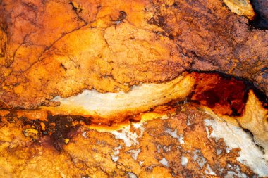 Kırsal taşlar, paslanmış dokular, renkli ve ilginç arka planlar ve büyüleyici dokular, web tasarımı ve soyut arkaplanlar için kullanılır.