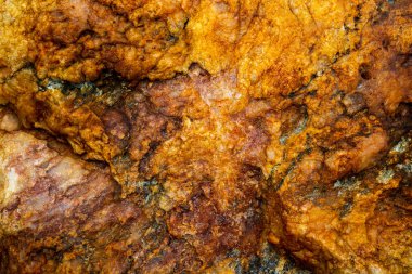 Kırsal taşlar, paslanmış dokular, renkli ve ilginç arka planlar ve büyüleyici dokular, web tasarımı ve soyut arkaplanlar için kullanılır.