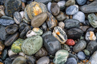 Kırsal taşlar, paslanmış dokular, renkli ve ilginç arka planlar ve büyüleyici dokular, web tasarımı ve soyut arkaplanlar için kullanılır.