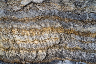 Kırsal taşlar, paslanmış dokular, renkli ve ilginç arka planlar ve büyüleyici dokular, web tasarımı ve soyut arkaplanlar için kullanılır.