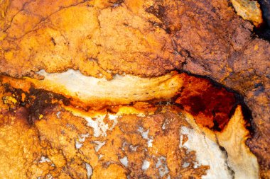 Kırsal taşlar, paslanmış dokular, renkli ve ilginç arka planlar ve büyüleyici dokular, web tasarımı ve soyut arkaplanlar için kullanılır.