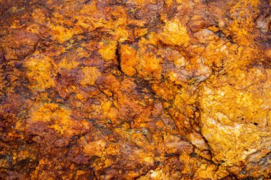 Kırsal taşlar, paslanmış dokular, renkli ve ilginç arka planlar ve büyüleyici dokular, web tasarımı ve soyut arkaplanlar için kullanılır.