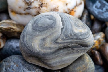 Kırsal taşlar, paslanmış dokular, renkli ve ilginç arka planlar ve büyüleyici dokular, web tasarımı ve soyut arkaplanlar için kullanılır.