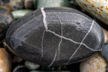 Kırsal taşlar, paslanmış dokular, renkli ve ilginç arka planlar ve büyüleyici dokular, web tasarımı ve soyut arkaplanlar için kullanılır.